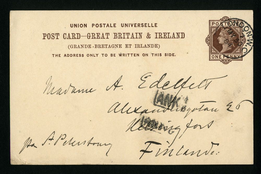 En bild av ett gammalt brev med brittisk poststämpel.